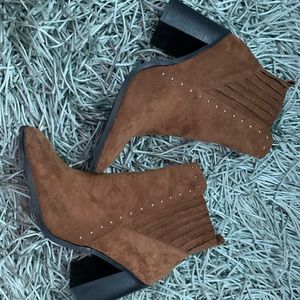 Brown heeled boots with gold studs